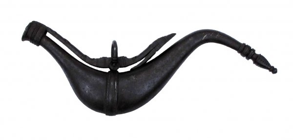 A MUGHAL POWDERFLASK: Earlier than generally found, forged entirely of iron, the bellied body with central band. Spring and both terminals heavily profiled. Suspension ring intact. First half of the 17th century. Brown ove