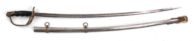 A U.S. M1876 CAVALRY SABER: Brass hilt with eagle and 13 stars and bakelite grip with fingerstalls. Single-edged, fullered blade marked at forte, R. JACOBS & SONS / BALTIMORE, MD. and etched for half its length on each side, inc
