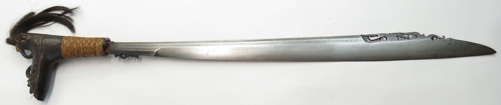 A DAYAK HEADHUNTER MANDAU SWORD (1 of 5)
