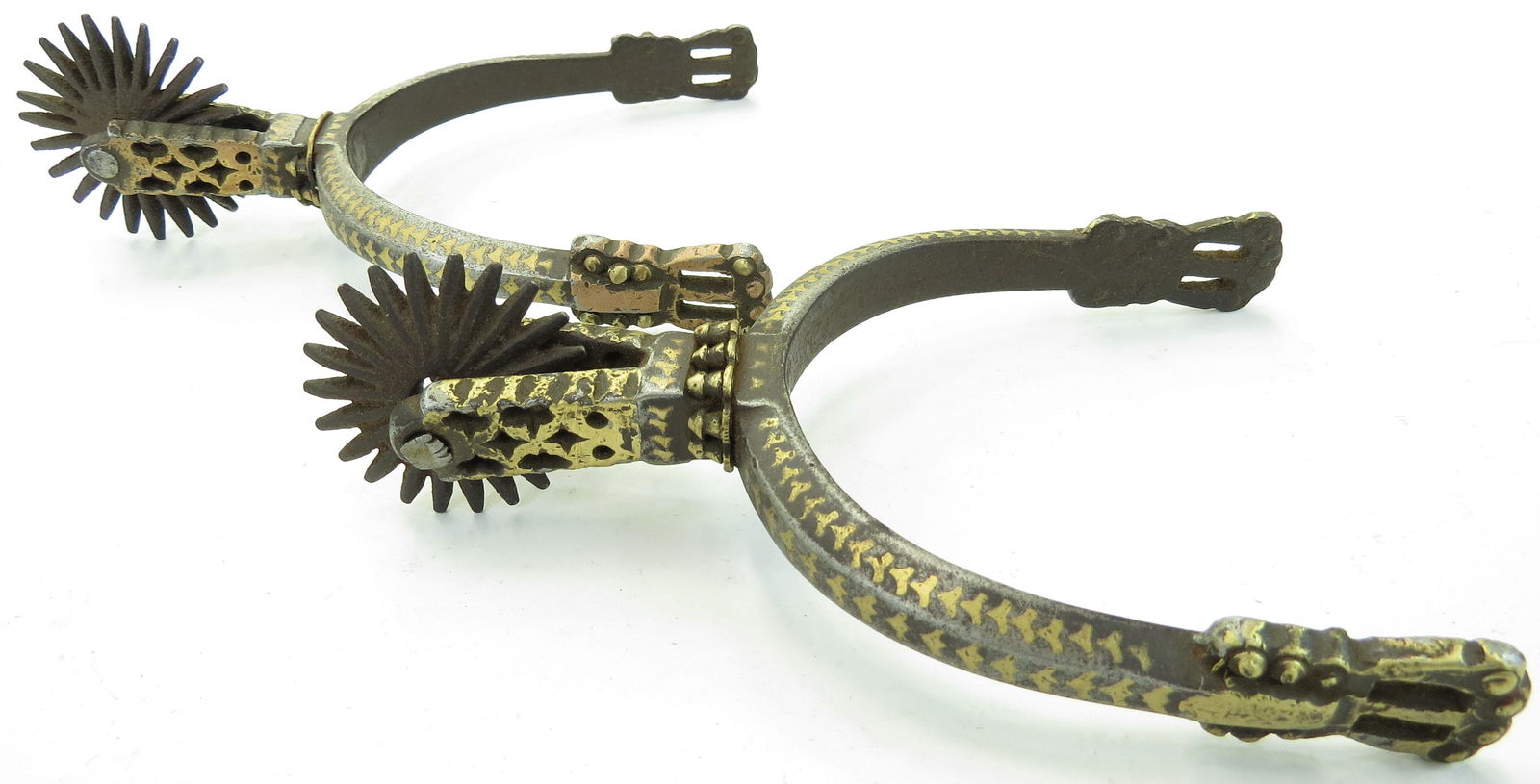 A RARE PAIR OF CHILEAN HUASO SPURS (1 of 3)