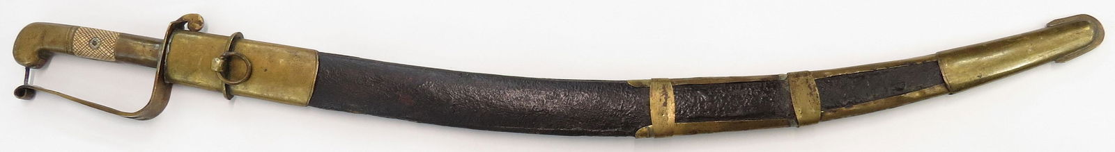 AN AFGHAN OFFICERS SWORD: The first standard Afghan infantry sidearm, the grip of chequered bone, with brass knucklebow. The curved blade broad, single-edged and fullered, wrought of actively-grained wootz. In its leather-cove