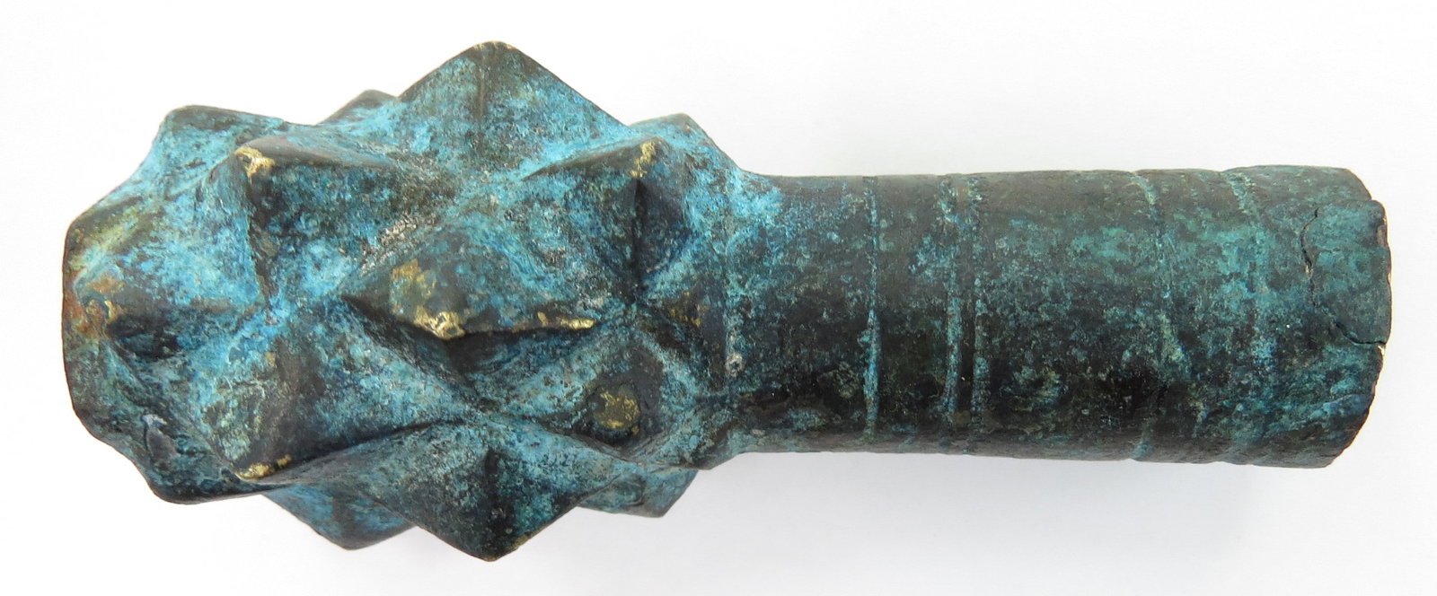 A RARE BYZANTINE MACEHEAD: Of spiked form, with characteristic integral socket. Dating to the period of the Fourth Crusade, in which crusading European armies conquered Constantinople, beginning in 1204. From a private Hungaria