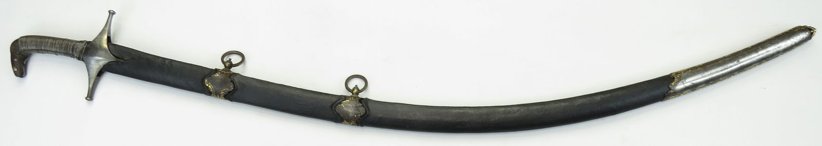 AN OTTOMAN SHAMSHIR SWORD: Provincial work, likely Egyptian, the grips with wire wrap, with steel guard. The fine, heirloom blade broad, with moderate curvature, wrought of Persian wootz, with distinct-edge hardening visible, w