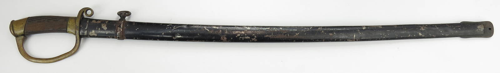 A PERSIAN M1881 SHASHKA SABER: Adopted directly from the Imperial Russian saber, originally made for the Iranian Cossack Brigade. With brass hilt and wooden grip. Steel blade marked at forte, in its steel scabbard. Well worn overal