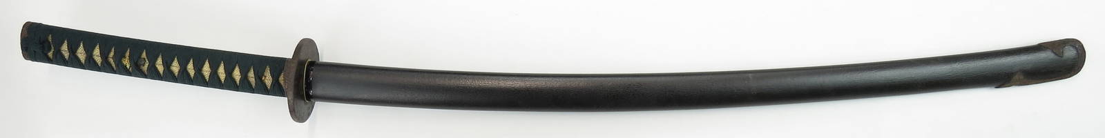 A JAPANESE KATANA SWORD: With iron tsuba signed KUNIHIRO, iron fuchi and kashira chiseled and gilded, tsuka with blue ito. Massive Edo Period blade in good polish, quite wide and long, with gunome temperline and mokume hada.