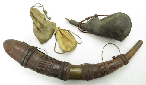 AN ASSORTMENT OF ANTIQUE BLACK POWDER ACCESSORIES