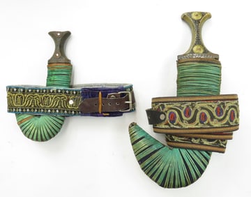 TWO ARAB KHANJAR DAGGERS
