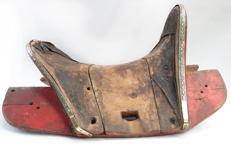 A CHINESE HEADMANS SADDLE