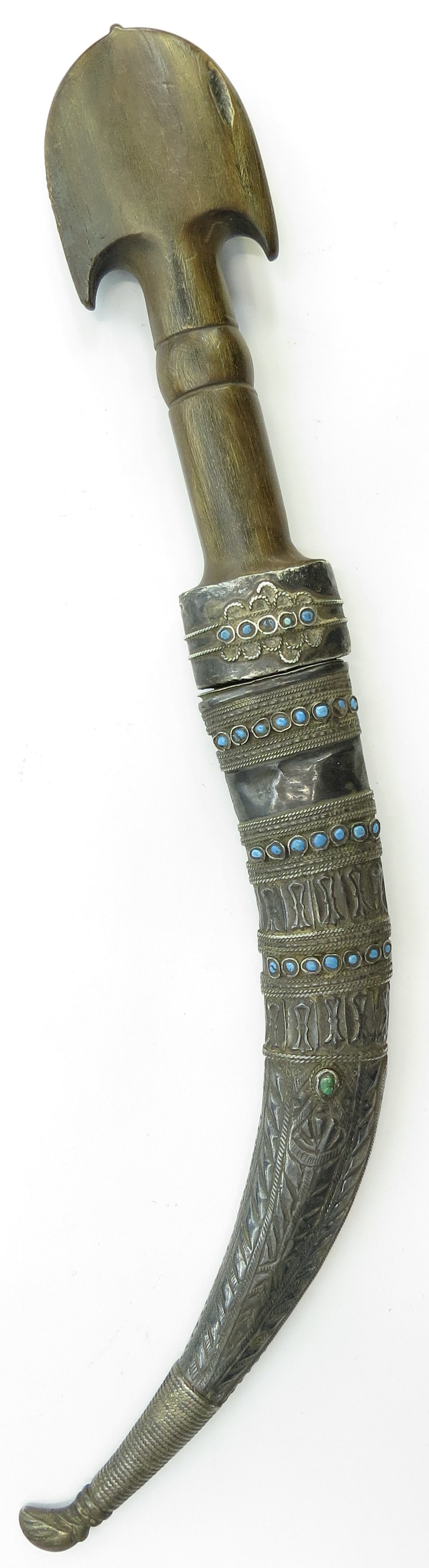 A RARE MARSH ARAB DAGGER: Characteristic of a group inhabiting Southern Iraq, an above-average example of form, with robust carved horn grip with silver ferrule set with turquoises and well-wrought blade with acute tip. In its