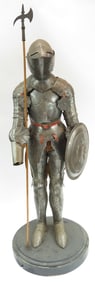 A MINIATURE SUIT OF ARMOR
