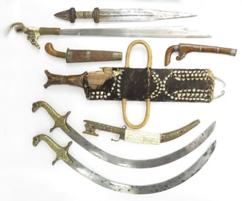 EIGHT ASSORTED ANTIQUE ARMS