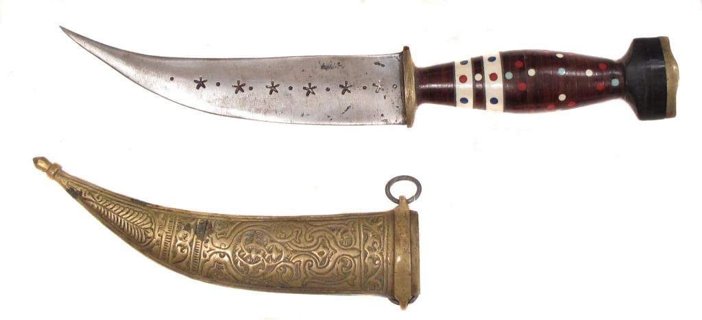 A SYRIAN KHANJAR DAGGER: With inlaid hilt and etched blade.In its brass sheath.Mid-20th century.Overall length 27.3 cm. Condition II