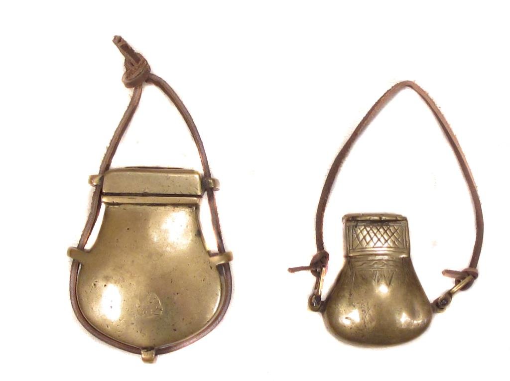 AN OTTOMAN PATCHBOX AND GREASEBOX: Each of brass, with lid intact.Early 19th century.The largest 8 cm. Condition II