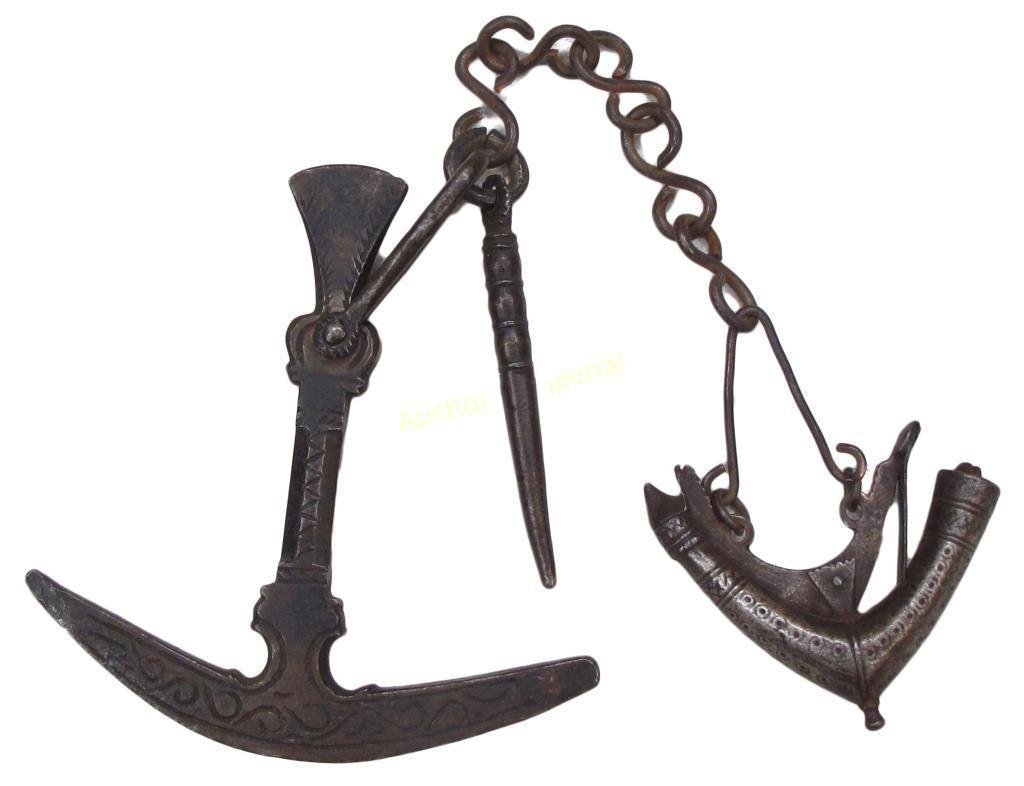 AN AFGHAN PRIMING FLASK, KNAPPING TOOL & VENT PICK: A well-wrought steel primer struck with bird€™s eye talismans, retained by a handwrought chain to a combination flint knapping hammer and screwdriver with rare engraved decoration, the vent pick s