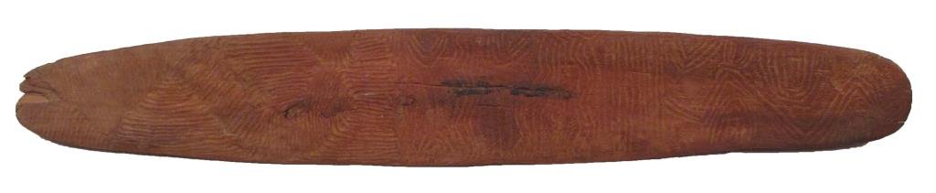 AN AUSTRALIAN ABORIGINAL KARRBINNA SHIELD: Western Australia, perhaps Karajarra People. Of the form employed in personal combat, carved of a single section of eucalyptus wood with integral grip as is typical. Both the obverse and reverse are i