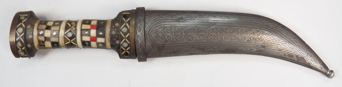 A SYRIAN KHANJAR DAGGER: With inlaid hilt and silver inlaid steel sheath. 20th century. Overall length 28.5cm. Condition II