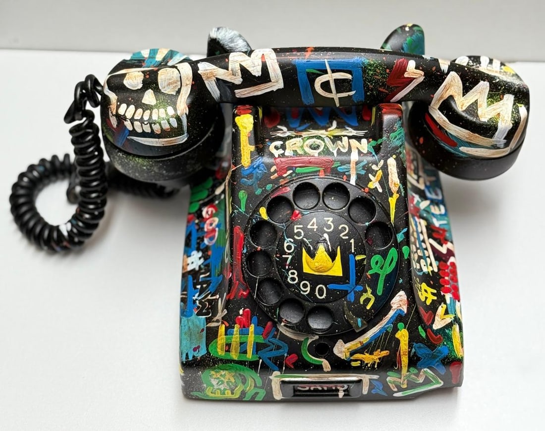 Jean-Michel Basquiat (Acrylic on Telephone) In the style of: Acrylic on Telephone, rendered in the style of Jean-Michel Basquiat. Measures: 4.5 inches high x 9 inches width and 7 inches depth aprox. Provenance: Private Collection.Provenance: Private Collection.