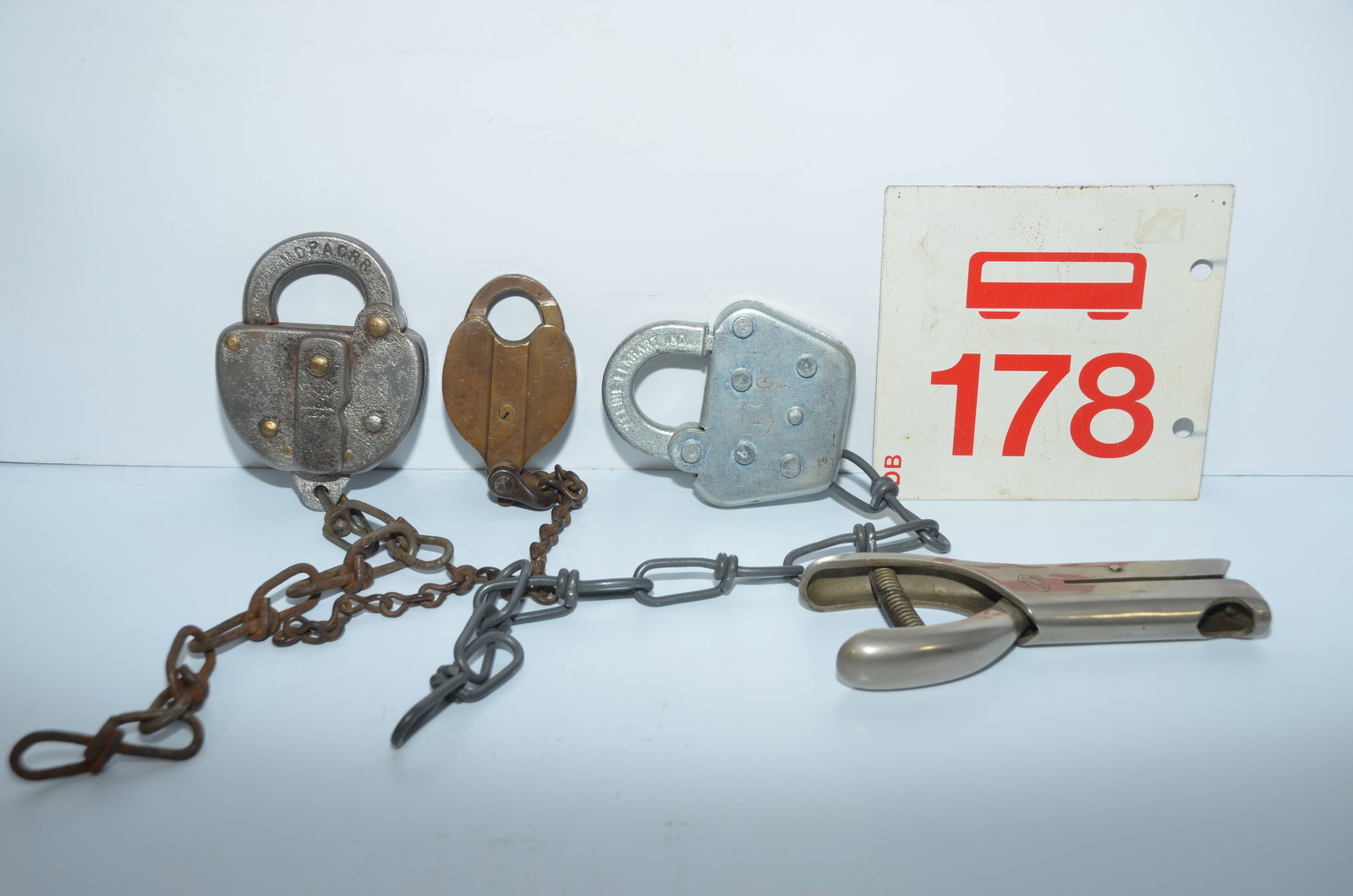 Three Railroad Locks, Ticket Puncher, and Trolley Stop Sign (1 of 5)