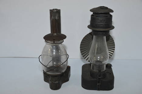 Two Different Dietz Lanterns-No. 15 Side Lamp and #25 W.P.A. Lamp: This is a pair of different Dietz lanterns. The first is a Dietz #15 side lamp. Clear plain globe; correct burner. Needs fount cap, which has been replaced by a cork. Rare item which dates to 1867. Th