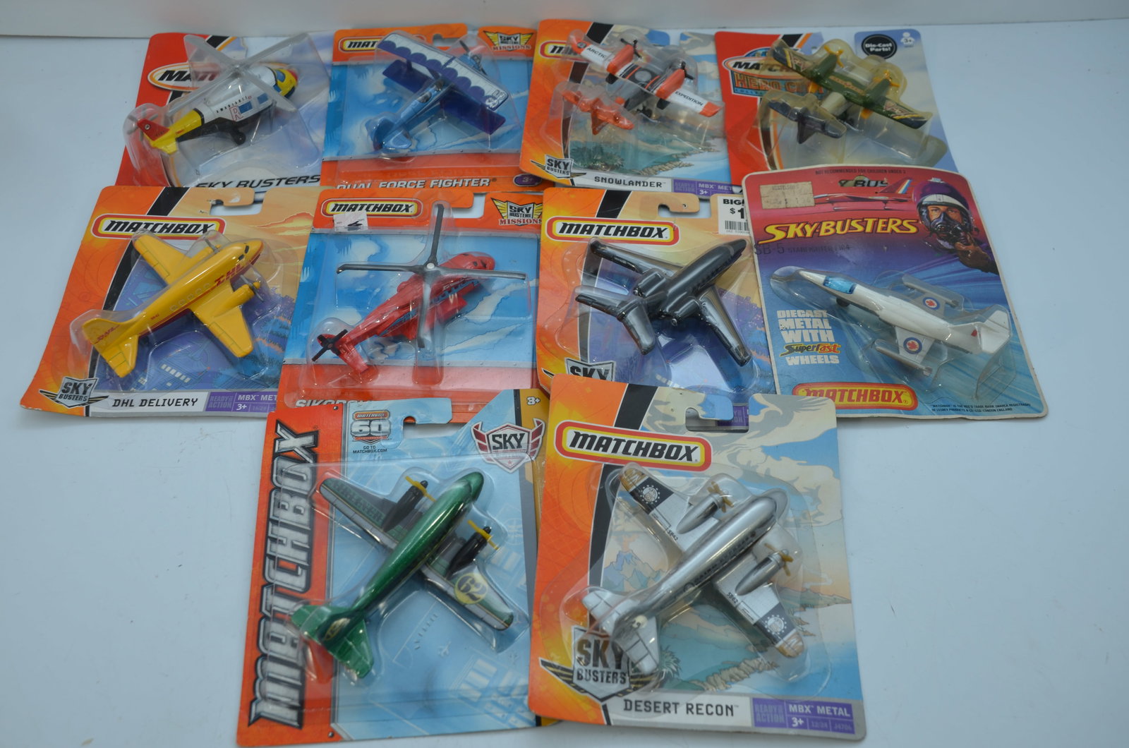 Matchbox Airplanes-Lot 2-20 Total Planes-New on Cards: This is a lot of 20 Matchbox airplanes, all new on their original cards. Includes helicopters, transport planes, commercial planes, vintage planes, and more. Each lot will be different. These lots var