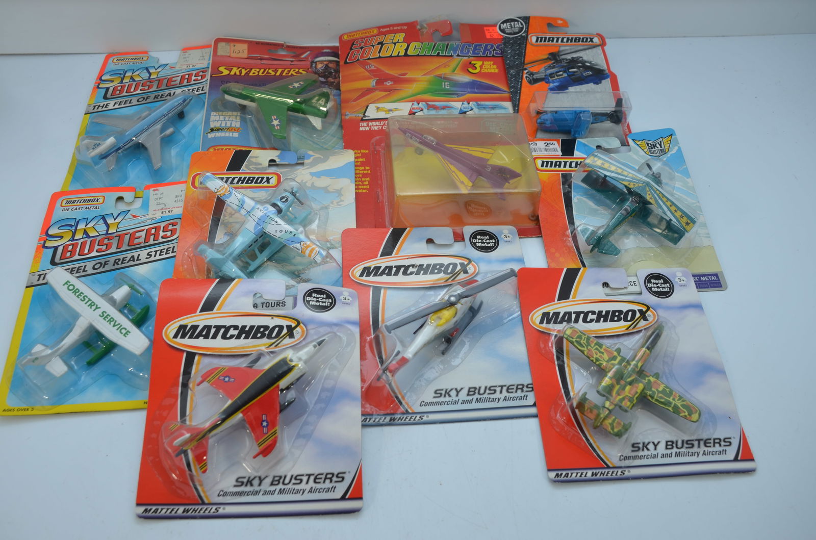 Matchbox Airplanes-Lot 3-20 Total Planes-New on Cards: This is a lot of 20 Matchbox airplanes, all new on their original cards. Includes helicopters, transport planes, commercial planes, vintage planes, and more. Each lot will be different. These lots var