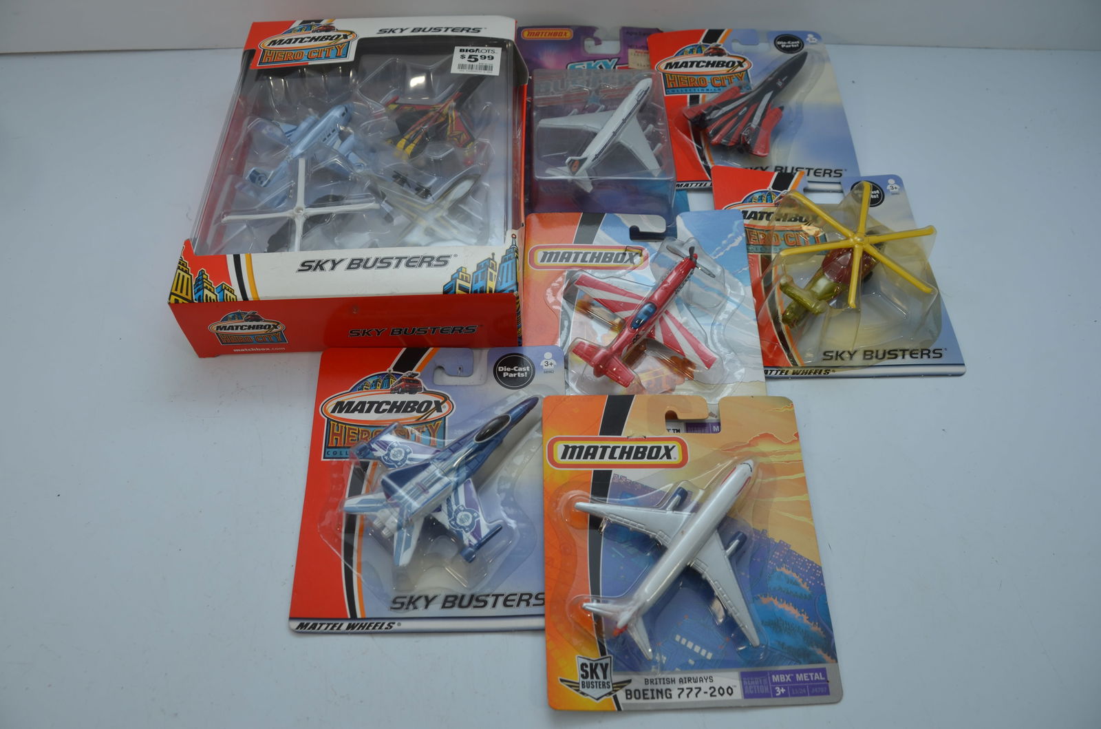 Matchbox Airplanes-Lot 7-20 Total Planes-New on Cards: This is a lot of 20 Matchbox airplanes, all new on their original cards. Includes helicopters, transport planes, commercial planes, vintage planes, and more. Each lot will be different. These lots var