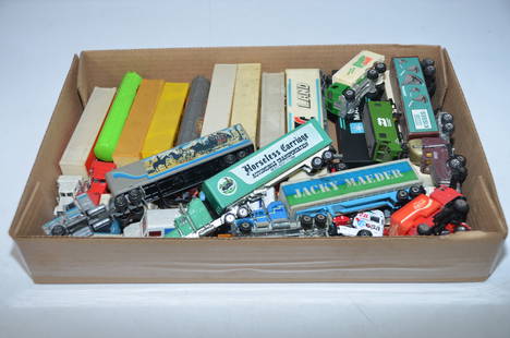 Over 40 Used Semi Trucks, Delivery Trucks, and Other Trucks-Lot 4: This is a lot of over 40 used semi, delivery, work, and other trucks that were removed from an HO scale model train layout. These are from many different manufacturers, including Matchbox, Hot Wheels,