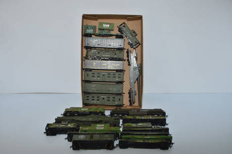 U.S. Army Train with 21 Locomotives and Cars-HO Scale: This is a U.S. Army train with 21 locomotives and cars in HO scale. The locomotives will need servicing to run well. Troop cars, a caboose, box cars, flat cars and others are included. Several have tr