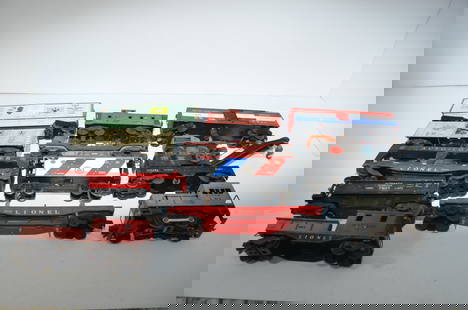 Thirteen Mixed Lionel O scale Cars and Locomotives: This is a lot of 13 mixed Lionel O scale cars and locomotives. They include an automatic refrigerated milk car 3472, autoloader auto rack 6414, automatic dump car 3469, wreck crane 6460, and more