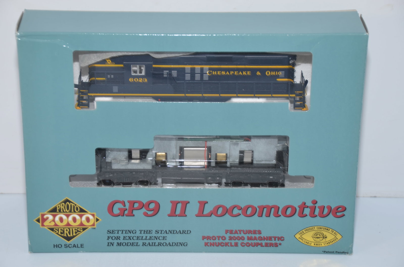 Chesapeake and Ohio RR Life-Like Proto 2000 GP9 II DC Diesel Loco #6023-HO Scale: This is a Chesapeake and Ohio Railroad Life-Like Proto 2000 GP9 II DC diesel locomotive #6023 in HO scale. The shell snaps easily onto the drive unit. New in the original box! It has been tested and w
