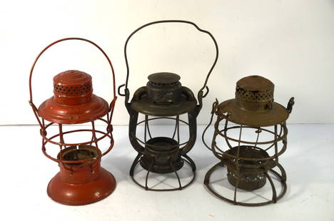 Eastern RR Switchmans Lanterns For Parts-Three: This is a lot of three switchmans lanterns from Eastern railroads for part or restoration. They are, from left to right in the main photo, an Adams and Westlake with a 1909 patent from the Delware