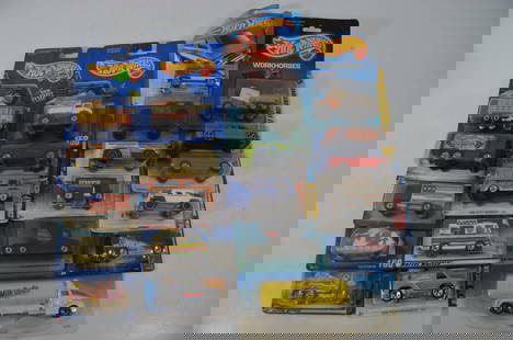 21 Hot Wheels Modern Trucks-New on Card-Lot 1: This is a lot of 21 Hot Wheels modern trucks that are all new-on card. See photos for details.