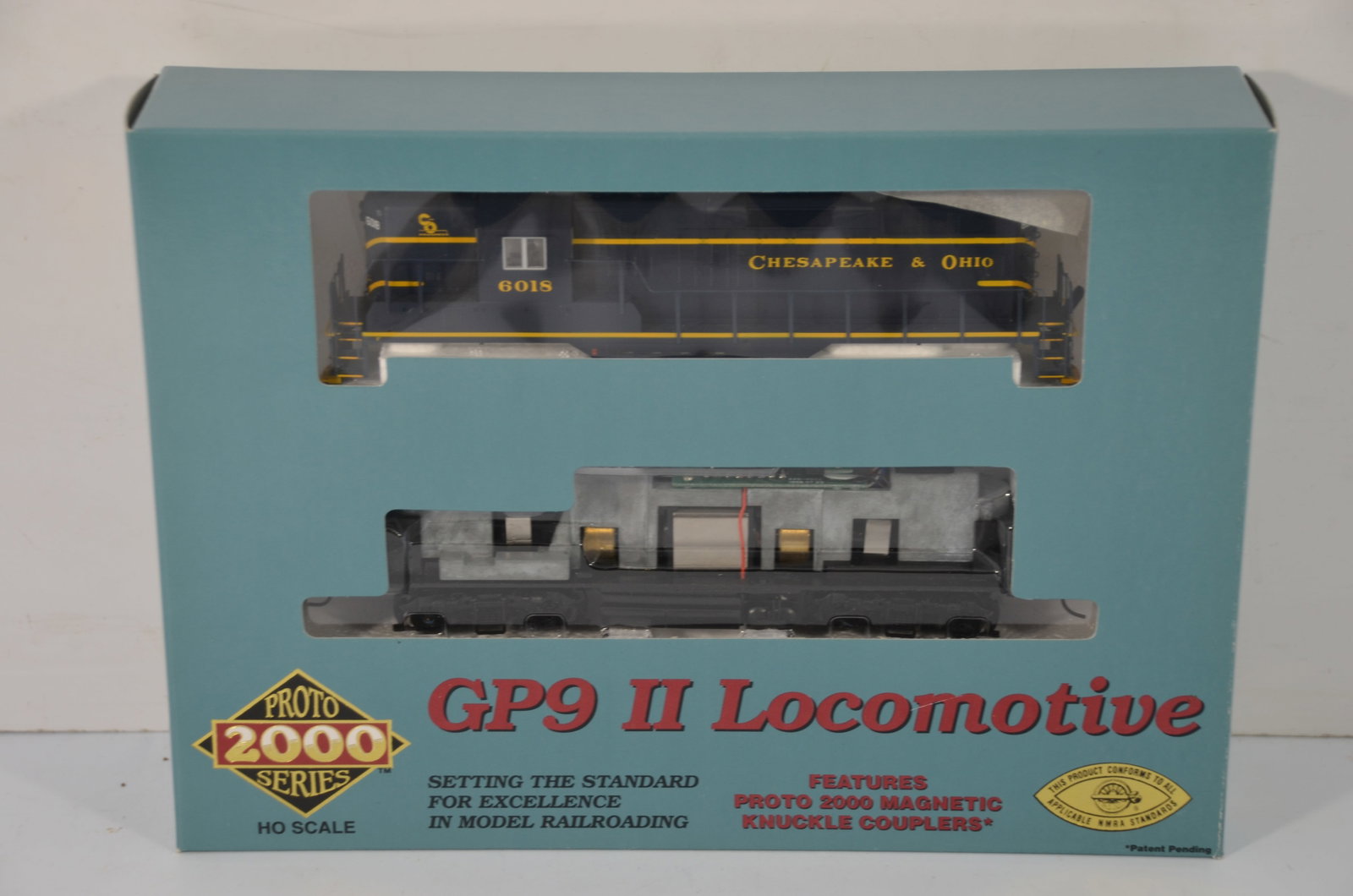 Chesapeake and Ohio RR Life-Like Proto 2000 GP9 II DC Diesel Loco #6018-HO Scale: This is a Chesapeake and Ohio Railroad Life-Like Proto 2000 GP9 II DC diesel locomotive #6018 in HO scale. The shell snaps easily onto the drive unit. New in the original box! It has been tested and w