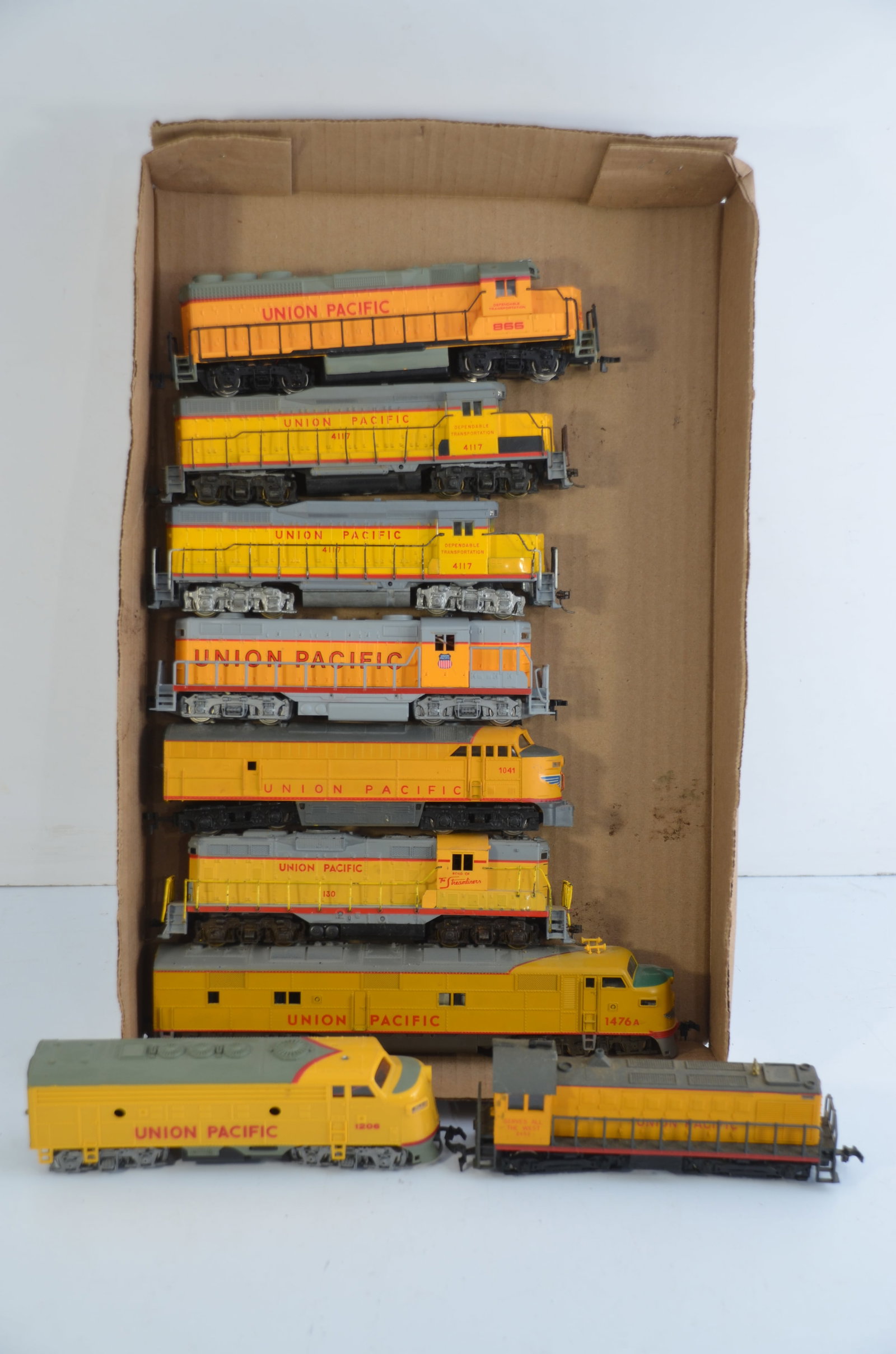 Nine Working Union Pacific RR HO Scale Diesel Locomotives: This is a lot of nine HO scale Union Pacific Railroad diesel locomotives in HO scale. All have been tested and run. We recommend servicing all older locomotives before putting them into regular servic