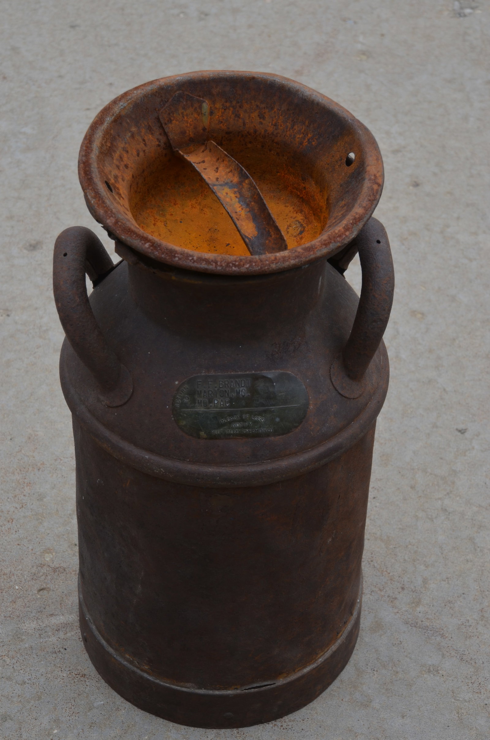Missouri Pacific RR Milk Can: This is a rare Missouri Pacific Railroad milk can. Cast brass tag shows it was shipped from the F.F. Brandt farm in Marion, MO to the Blue Valley Creamery in Hastings, NE, by the MO PAC, and then retu