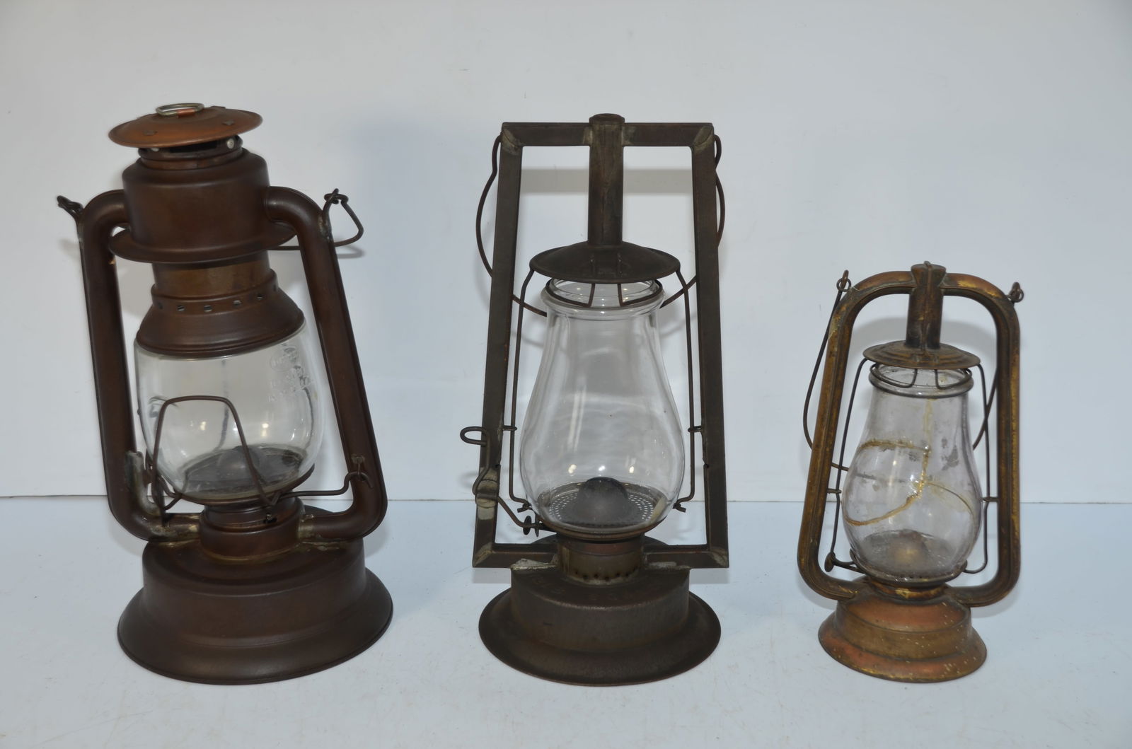 Three Steam Gauge and Lantern Company Tubular Lanterns (1 of 10)