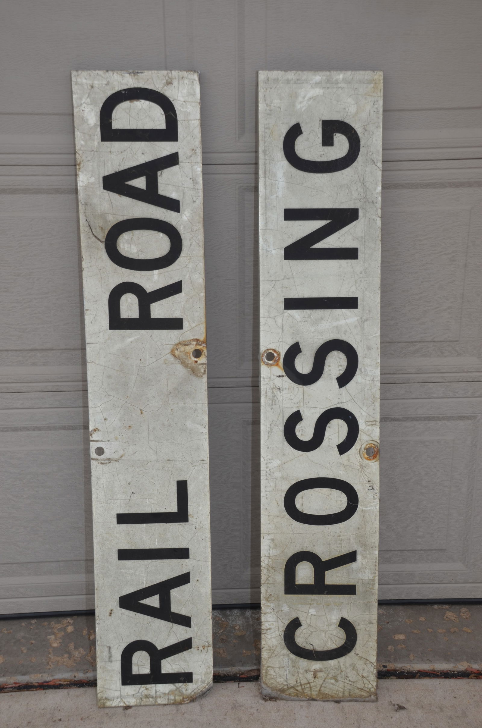 Modern Metal Reflective Railroad Crossing Sign: This is a modern metal reflective railroad crossing sign. Still has nice reflective qualities. Has a slight bend in the CROSSING leg that could be easily fixed. Good used sign