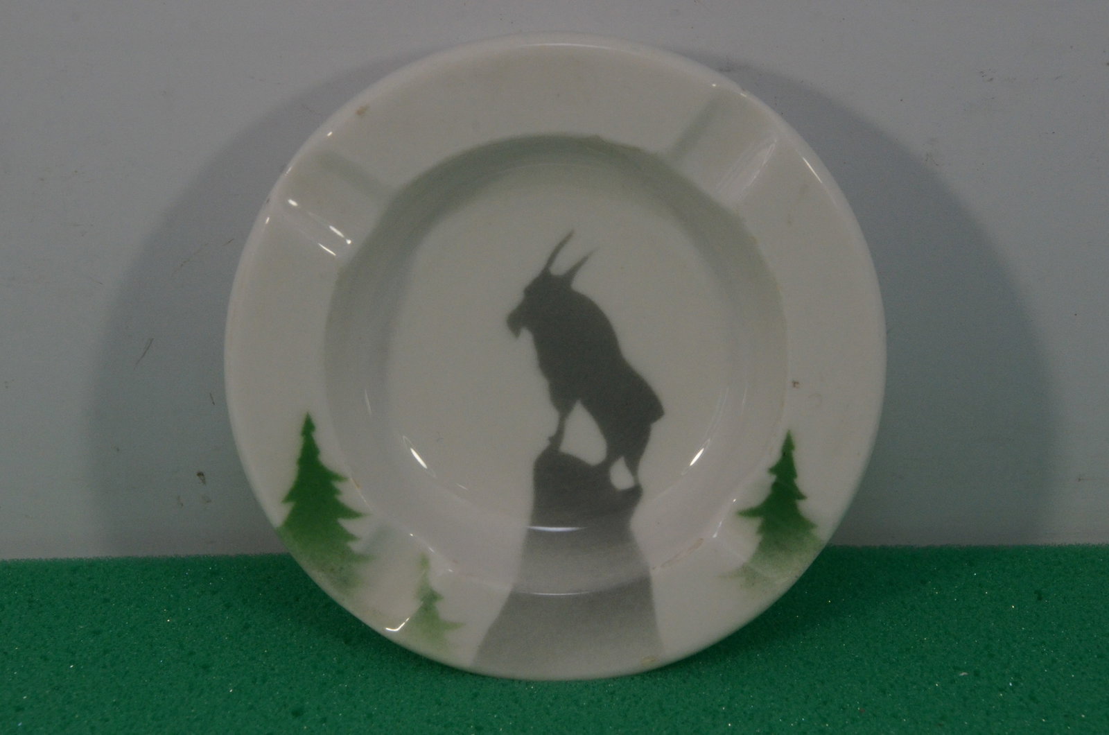 Great Northern RY Glory of the West Butter Pat: This is a Great Northern Railway butter pat dish. It is 4 inches in diameter, and has the plain white background. This is one of the Glory of the West patterns. Back is stamped O.P. CO. SYRACUSE CHINA