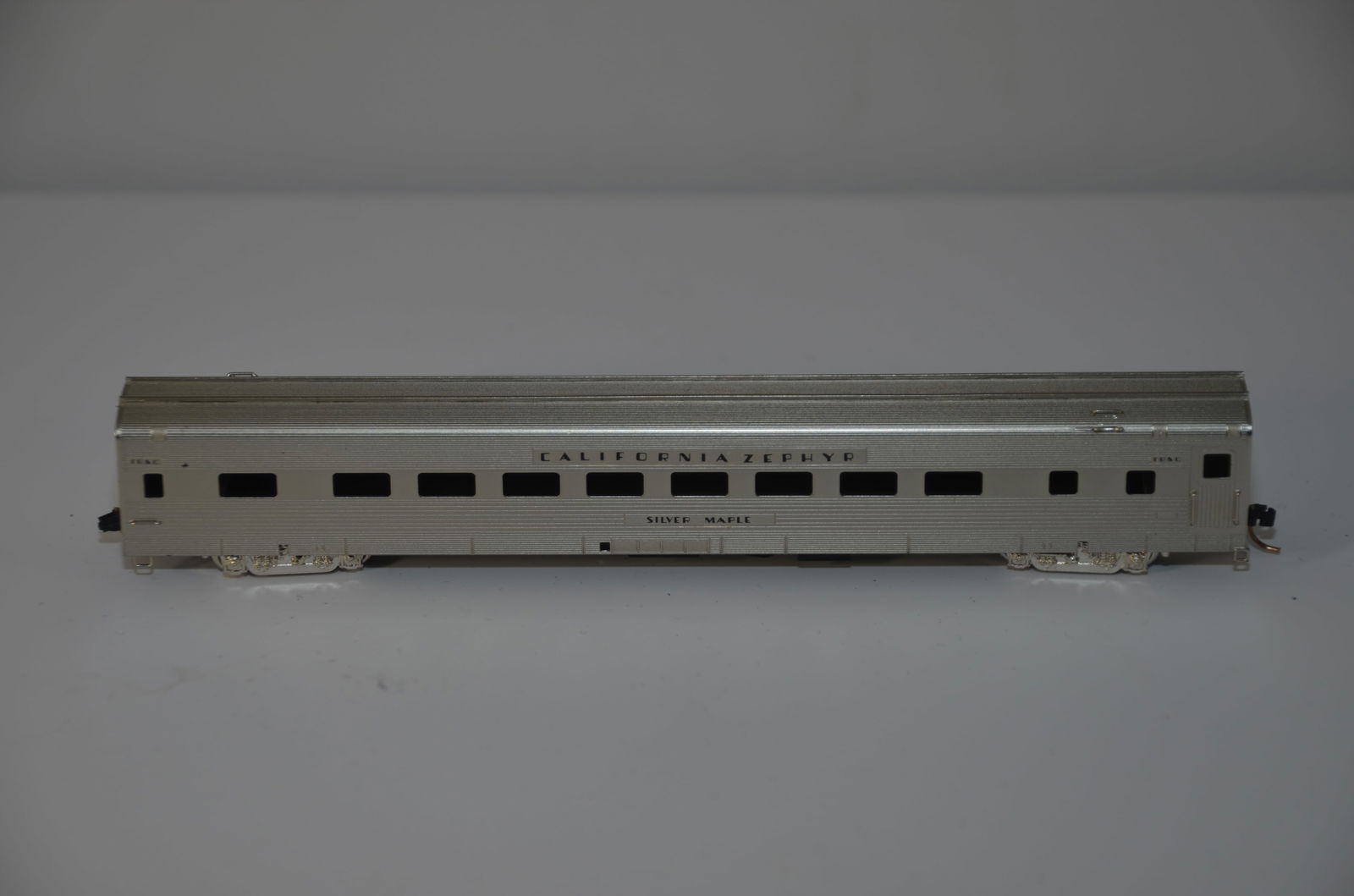 California Zephyr Coach SILVER MAPLE-Oriental Ltd Brass Models-N Scale: This is a California Zephyr coach SILVER MAPLE #4742, in N scale. New in the original box. Made by KMT in Japan and distributed by Oriental Limited Brass Models.