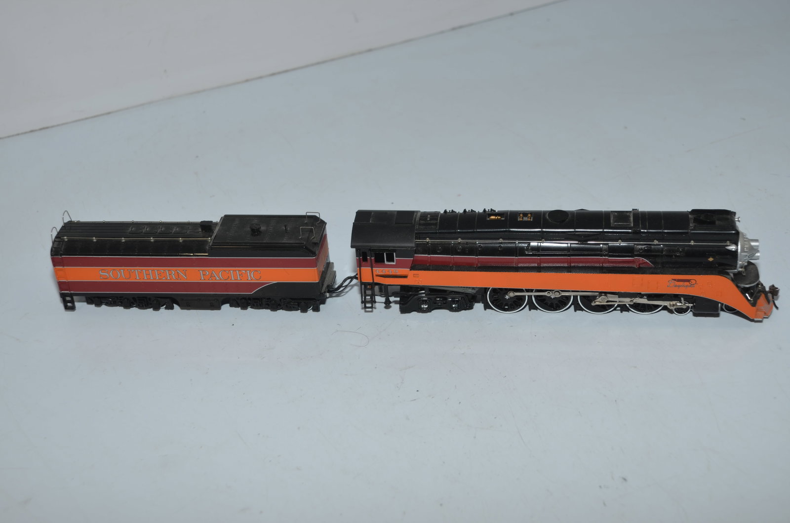 Southern Pacific RR 4-8-4 Steam Locomotive #4449-DC-Bachmann: This is a Southern Pacific Railroad 4-8-4 DC steam locomotive #4449, in HO scale. Made by Bachmann. Tested and runs well! No warranties or guarantees on used locomotives. Sold as-is, where is.