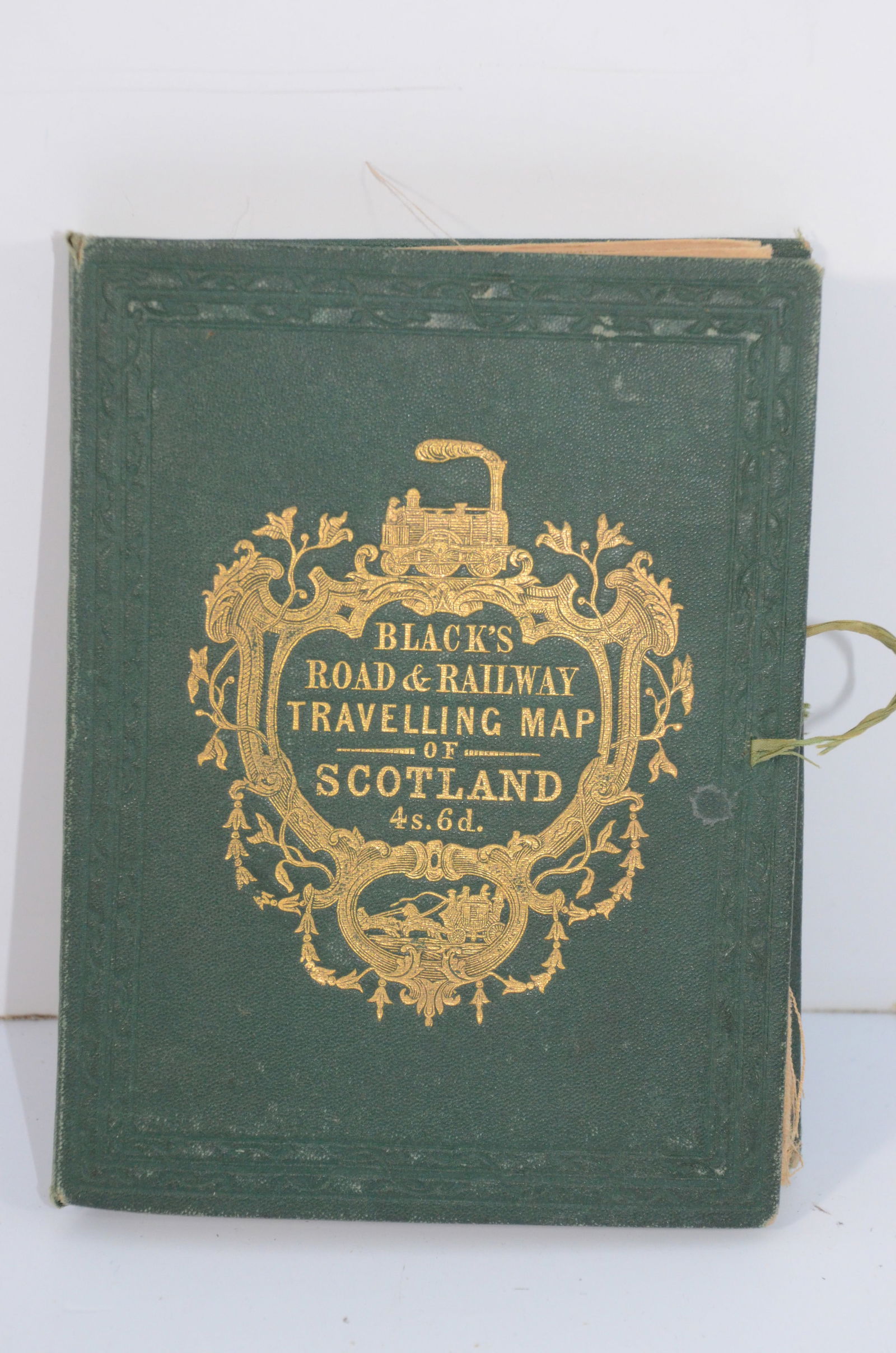Blacks Road and Railway Travelling Map of Scotland ca 1865: This is a Blacks Road and Railway Travelling Map of Scotland, ca. 1865. Comes in a bound book, and folds out into 36 panels, paper on linen, with a beautiful full color map of Scotland, with all rail