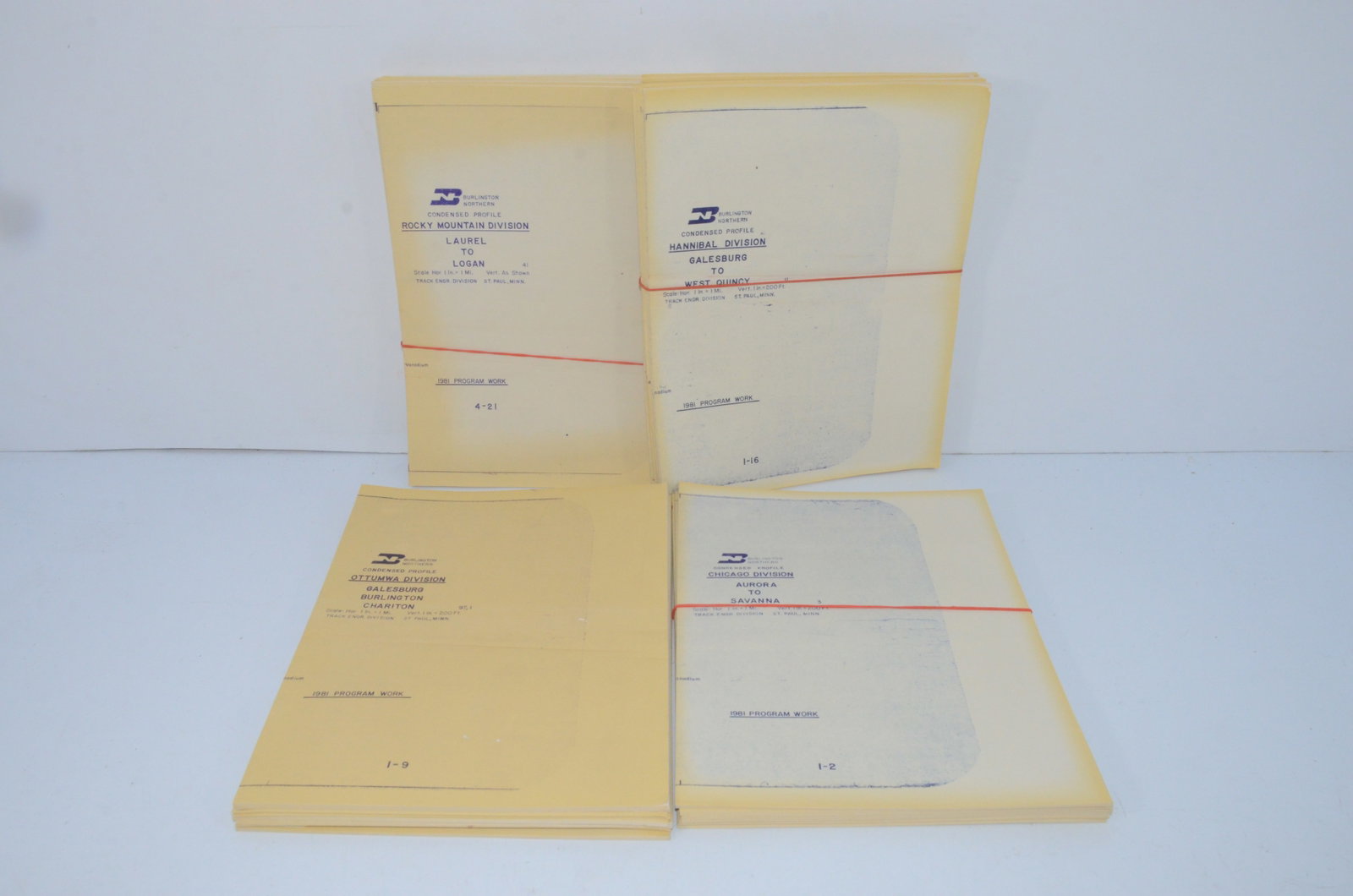 Burlington Northern RR-Condensed Profiles-1981: This is a stack of Burlington Northern Railroad Condensed Profiles from 1981. These represent trackage in four different divisions, the Rocky Mountain, Hannibal, Ottumwa, and Chicago Divisions. Each d