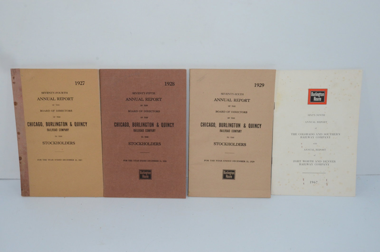 Chicago Burlington and Quincy RE 1927/28/29/67 Annual Reports: This is a lot of 4 Chicago Burlington and Quincy Railroad annual reports, dating 1927. 1928, 1929, and 1967. Come with color route maps. Nice used condition with minor tears or frays
