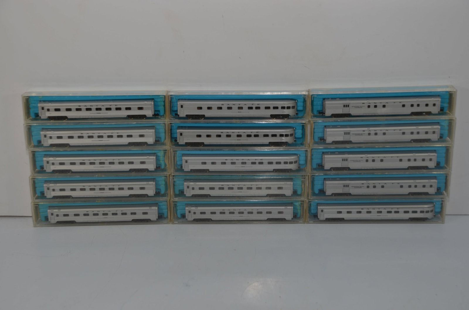 15 Santa Fe RR Illuminated Passenger Cars-N Scale-Atlas: This is a lot of 15 Santa Fe Railroad N scale passenger cars, made by Atlas. All are new in their original boxes. They include baggage/dormitory cars, observation cars, and coaches. All of these cars 