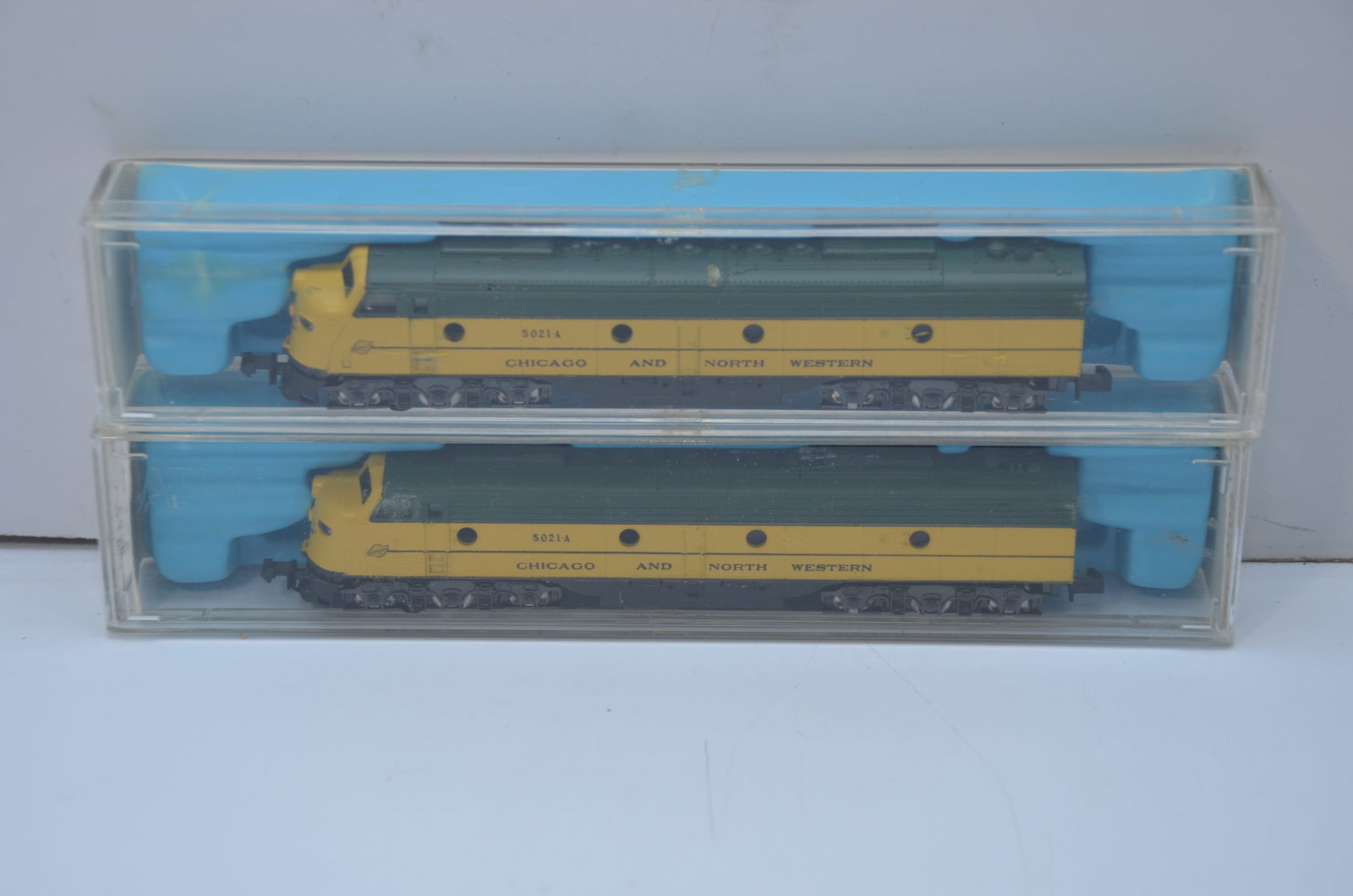 Chicago and Northwestern RY Atlas EMD E8A Diesel Locomotive Pair #5021A-N Scale: This is a pair of Chicago and Northwestern Railway EMD E8A diesel locomotives, made by Atlas in N scale. They have been tested and run well. Both are DC, and both are used, but are in their original b