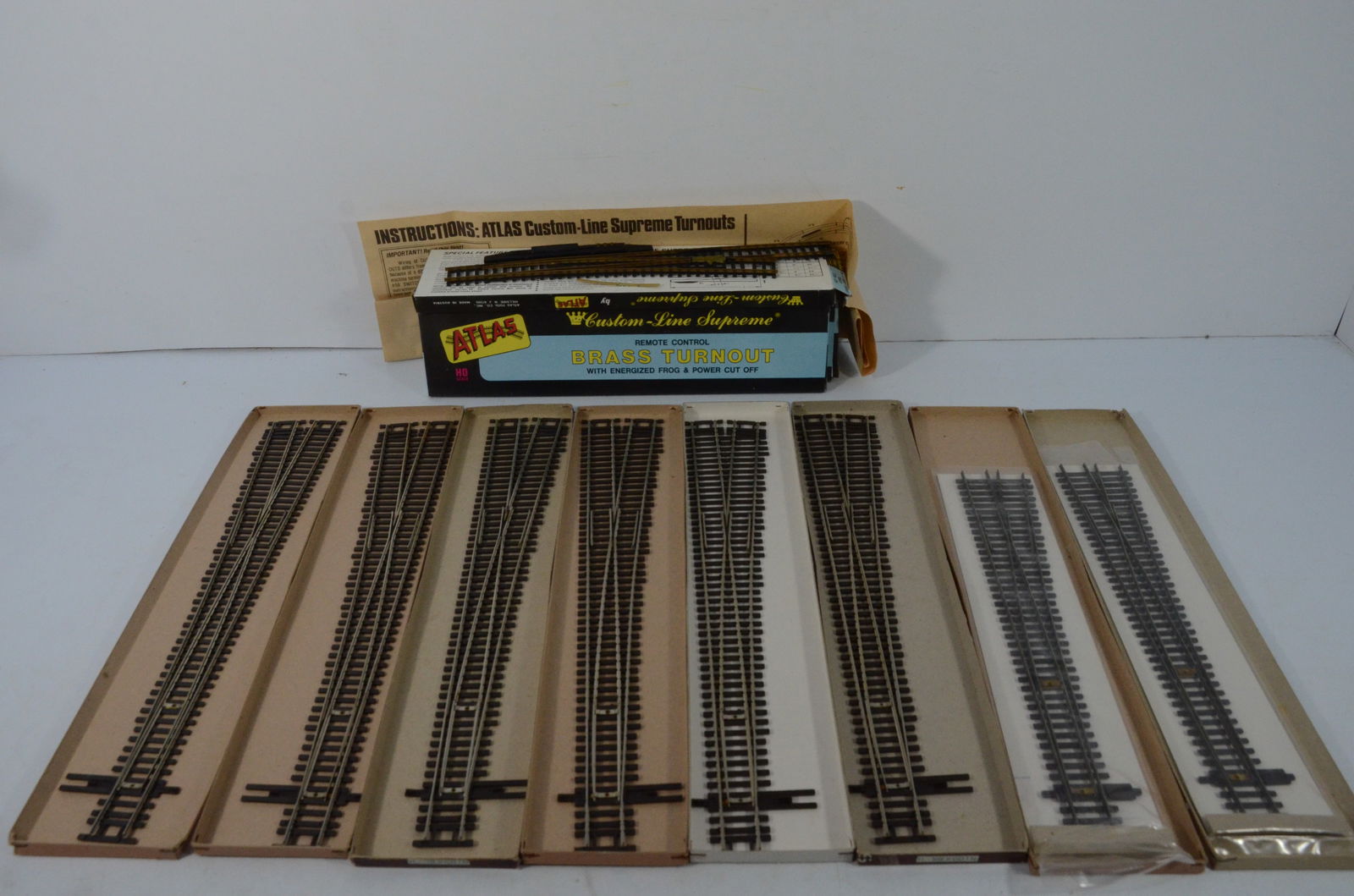 Eight Shinohara and Five Atlas Switches/Turnouts-HO Scale: This is a lot of eight Shinohara turnouts, three left hand and five right hand,and all code 100 rail, along with five brass #6 Atlas Supreme turnouts (four right; one left), that are all new and unuse