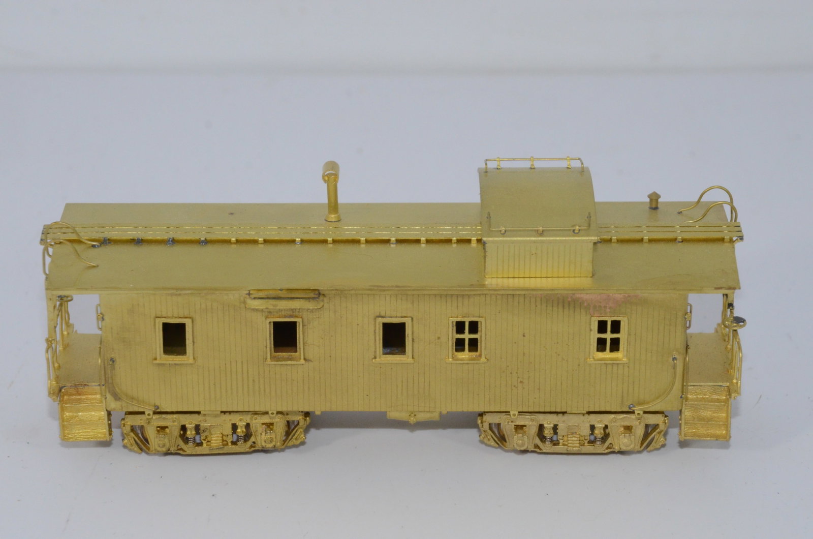 Brass HO Scale Wood Cupola Caboose-MSM Brass Models: This is a brass HO scale wood cupola caboose. Manufactured by MSM Brass Models in Korea. Looks to be new, but we are selling as used. Does not come in the original box