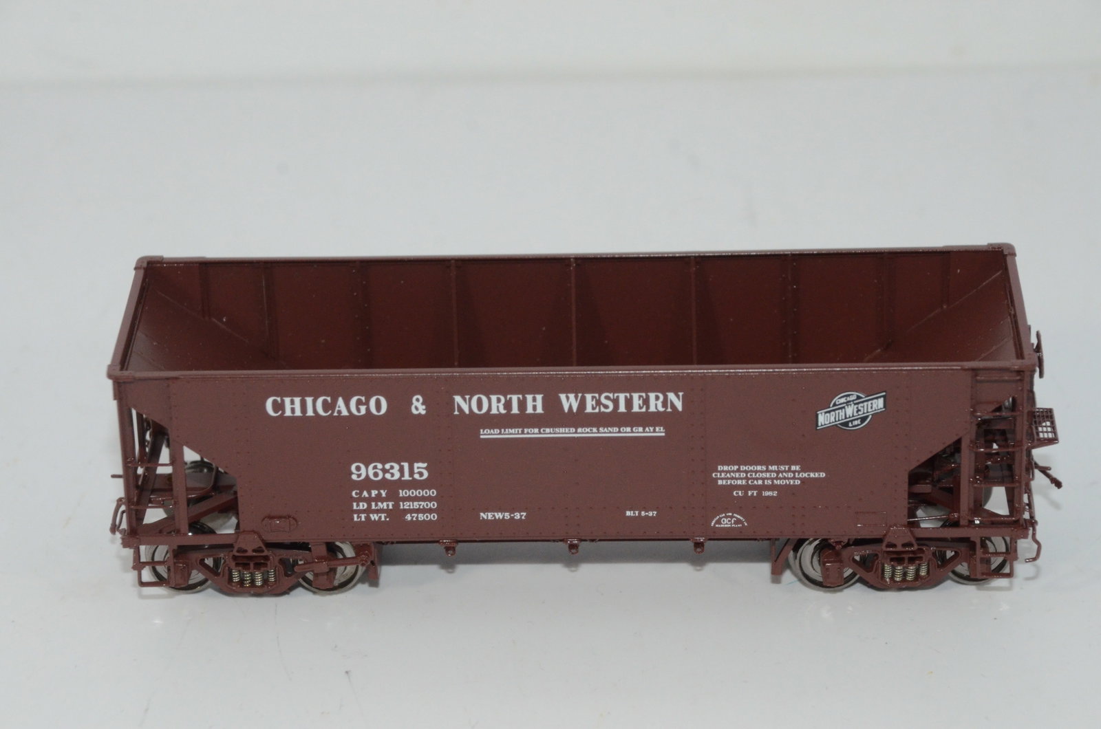 Chicago and Northwestern RR Hart Ballast Car-Challenger Brass Imports-HO Scale: This is a Chicago and Northwestern Railroad brass ACF Hart selective ballast car #96315 in HO scale. Made in Korea and distributed by Challenger Brass Imports. New, but not in its original box.