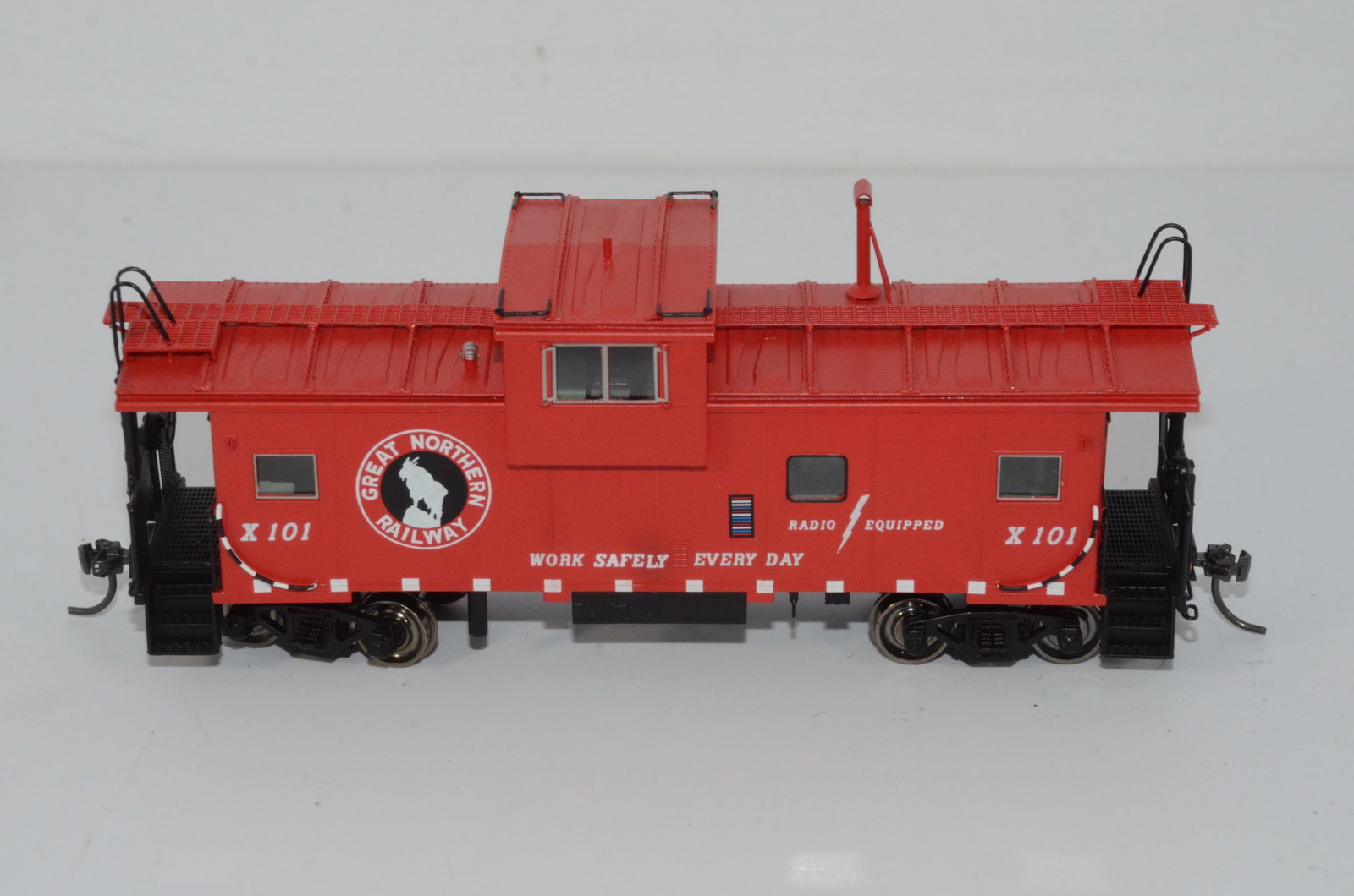 Great Northern RR International Wide Vision Caboose-Overland Brass-HO Scale: This is a Great Northern Railroad brass International wide vision caboose #X-101 in HO scale. Made by Ajin Precision in Korea and distributed by Overland Brass Models. New in the original box.