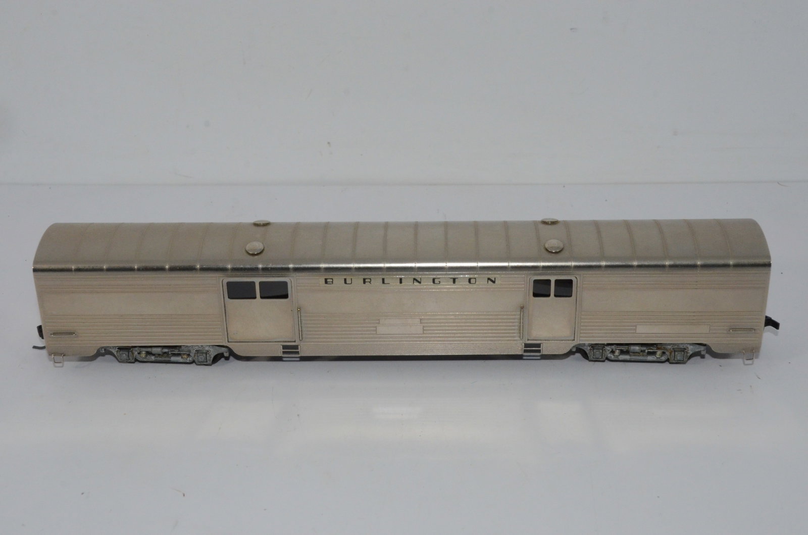 Chicago Burlington and Quincy RR Baggage Car-Lambert Associates Brass-HO Scale: This is a Chicago Burlington and Quincy Railroad brass baggage car in HO scale. Made in Japan and distributed by Lambert Associates Brass Models. Used, but it the original box.